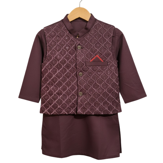 Maroon traditional outfit with a patterned jacket and matching pants on a hanger against a white background.