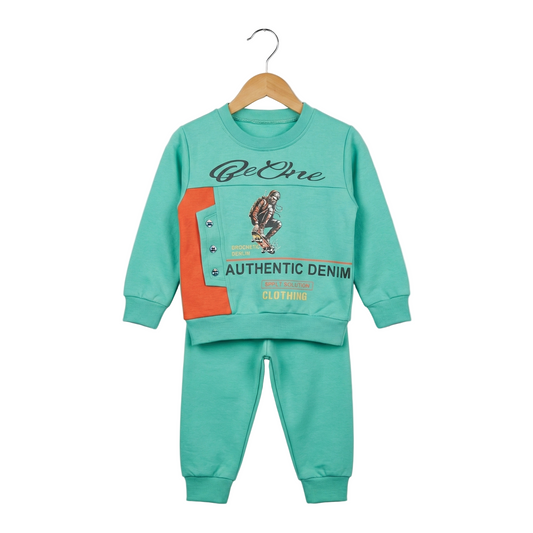 Children's teal sweatshirt and pants set with graphics on a hanger against a light gray background