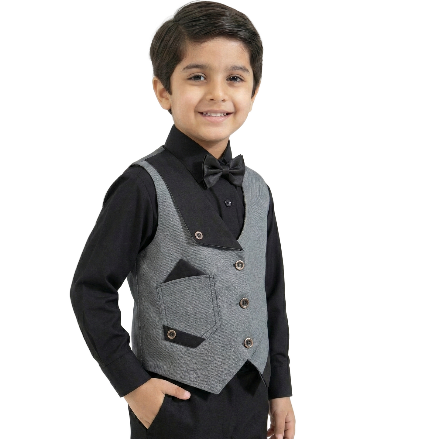Young boy wearing a gray vest over a black shirt with a bow tie on a white background